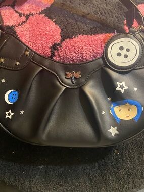 Pre-love in good condition  Coraline Key Chain Glow-In-The-Dark Baguette Bag